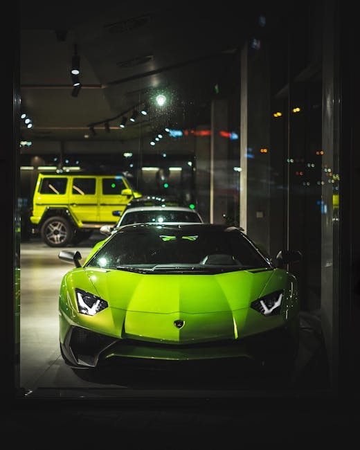 Front view of a vibrant green Lamborghini Aventador in a modern car showroom.